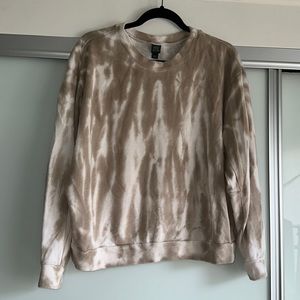 A Brown tie dye sweatshirt.